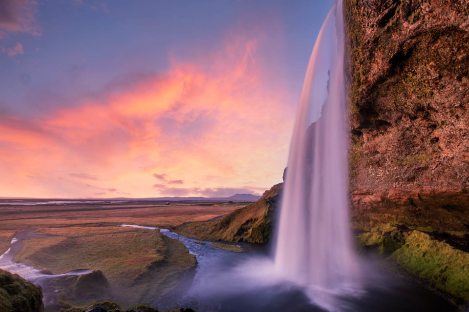 Long exposure of Seljalandsfoss waterfall in Iceland at sunset